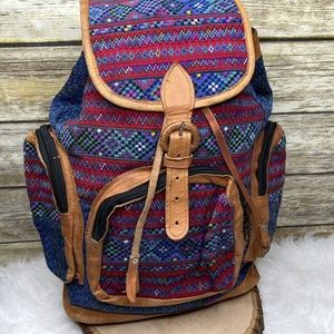 Multicolor Tapestry Embroidered Fabric Tan Leather Trim Drawstring Backpack
